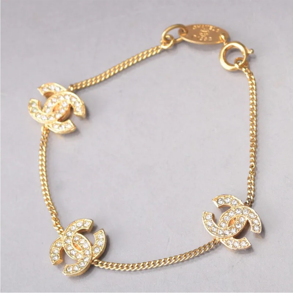 FLASH SALE - Chanel Coco crystal charm bracelet 24K gold hardware CC